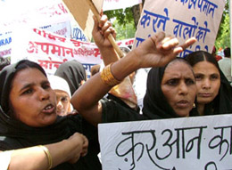 Members of the BJP minority wing shout anti-US slogans during a rally  to condemn the alleged desecration of the holy Koran by the US interrogators at Guantanamo, near American embassy in the Capital on Thursday.