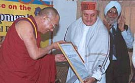 Actor Anupam Kher being given the Himachal Award for Excellence by the Dalai Lama. Also seen in the picture is former cricketer Bishan Singh Bedi.
