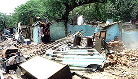 A scene of jhuggi basti, which was demolished by the MCD, outside the Pusa Institute in the Capital on Friday