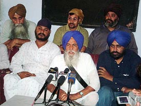 SGPC Haryana unit chief Joginder Singh Aharwan and others at a news conference in Hisar on Saturday