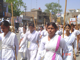 Women march in Abohar as part of a five-day training camp