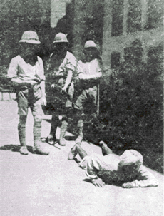 Men of the 25th Londons enforcing the crawling order