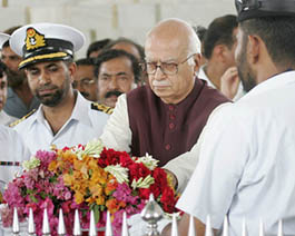 Opposition leader Lal Krishan Advani lays a flower wreath at the mausoleum of Mohammed Ali Jinnah, founding father of Pakistan, in Karachi on Saturday. 