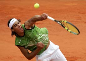 Spains Rafael Nadal serves during the mens singles final against Argentinas Mariano Puerta in the French Open