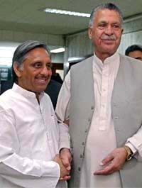 Pakistans Petroleum Minister Amanullah Khan Jadoon greets Indias Petroleum Minister Mani Shanker Aiyar in Islamabad