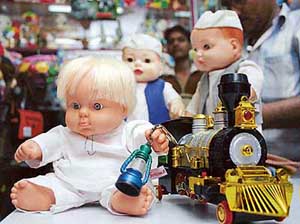 Rail Minister and RJD chief Lalu Prasad Yadavs look-alike toys on display at a showroom in Patna on Monday.