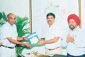 Mr D.S. Mangat, DPI (Colleges), UT, Chandigarh, releases a copy of the common prospectus for all four government colleges of Chandigarh on Monday.