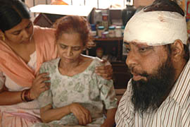 Injured Mr Karam Singh and his wife, Mrs Balwinder Kaur, a paralytic patient, who were injured and looted at gunpoint by a gang of robbers in their house in Singhpura village near Zirakpur in the wee hours on Monday.