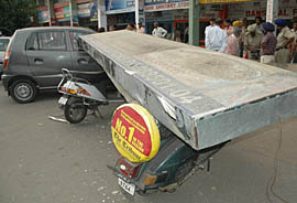 The duststorm which lashed the city and surrounding areas brought down the hoardings in Sector 22, Chandigarh on Monday.