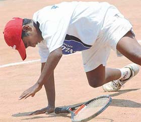 Dinesh Kantham from Sri Lanka in action at the AITA Talent Series Tournament being held at St. Peters School, Sector-37, Chandigarh