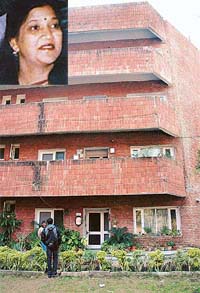 The location of Dr Babitas house from where she was suspected to have jumped from her top floor flat and inset, Dr Babita KauraThe location of Dr Babitas house from where she was suspected to have jumped from her top floor flat; and (inset) Dr Babita Kaura