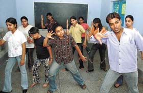Schoolchildren taking dancing tips at a summer camp organised at Bal Bhawan School in the Capital