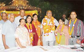 Mr Amrit Lal Aggarwal, who was re-elected president of the Punjab Pradesh Aggarwal Sammelan, with other office-bearers of the state body