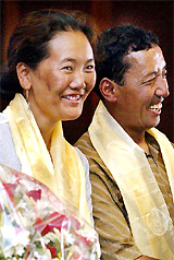 Lakpa Sherpa of Nepal and compatriot Appa Sherpa pose at an honouring ceremony in Kathmandu on Thursday. Lakpa Sherpa is the first women to scale Mount Everest five times while Appa Sherpa reached the summit a record 15 times
