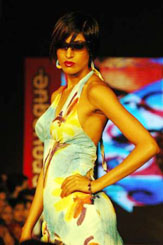 Jesse Randhawa performs at a Provogue show in Mumbai. Provogue plans to branch out to womens wear, childrens wear, innerwear, eyewear, shoes and denim segments. The company plans to open 40 new Provogue Studios and 21 larger format stores in the next two years.