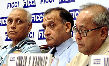 From right: Defence Minister Pranab Mukherjee, Naval Chief Admiral Arun Prakash and Air Chief S.P. Tyagi at a seminar on Indian Defence Industry 'Forging a public-private partnership' organised by FICCI in Delhi on Wednesday. 