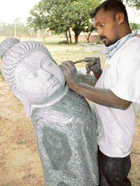 M.A. Srikhandan of Tamil Nadu during a sculpture camp held at Kalagram, Chandigarh. 