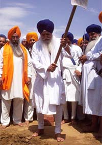 Giani Joginder Singh Vedanti, Jathedar, Akal Takht, lays the foundation stone of a gurdwara