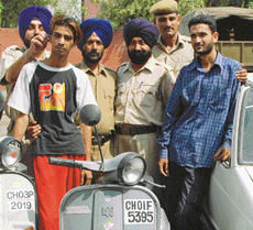 Vehicle lifter Amit Kumar and Jagbir Sandhu arrested by the Chandigarh police at the Sector-34 police station in Chandigarh on Thursday.