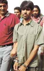 A Hizb-ul-Mujahideen member, Mohammad Ali, in police custody in the Capital on Friday.