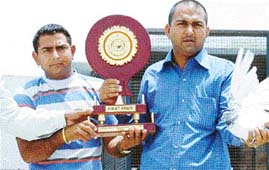 Winners of the pigeon-flying competition with trophy, which concluded on Thursday in Ludhiana.