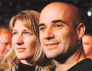 Andre Agassi is one of the best character actors on court. Also seen in the photo is Steffi Graf