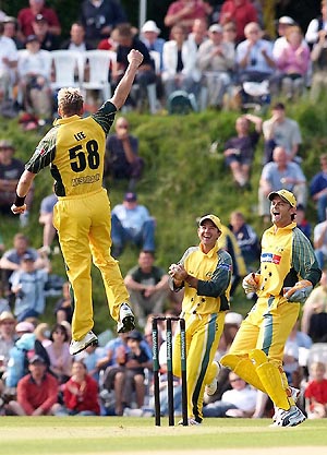 Brett Lee celebrates with Ricky Ponting and Adam Gilchrist after dismissing Stephen Fleming off the very first ball of Australias Ashes tour