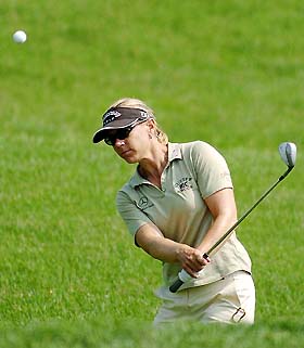 Annika Sorenstam of Sweden chips a shot out of the rough on the 15th hole during the first round at the McDonalds LPGA Classic in Harve De Grace, Maryland, on Thursday