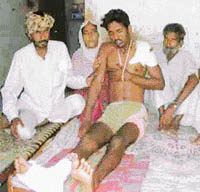 Injured Saudagar Ali with his family members at Rohira village, near Ahmedgarh. 