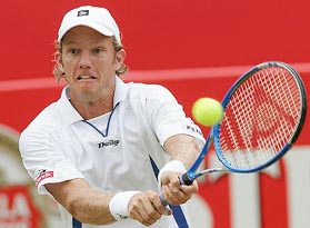 Thomas Johansson of Sweden plays a shot during his quarterfinal match against Tim Henman of Great Britain in the Stella Artois Tennis Championship at Queens Club in London on Friday. Johnansson won 6-4, 6-4. 