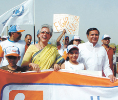 Delhi Health Minister Yoganand Shastri and social activist Nafisa Ali participating in a march to highlight global hunger at India Gate in the Capital on Sunday.