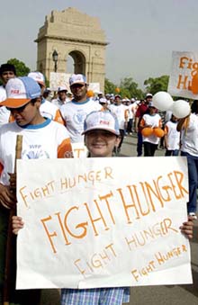 Children participate in Walk the World organised by the UN World Food Programme in New Delhi on Sunday.