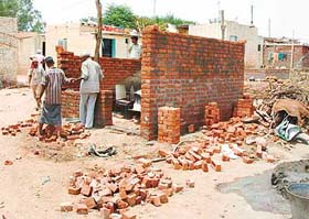 New constructions are coming up on HUDA land at Kharag Mangoli village in Old Panchkula