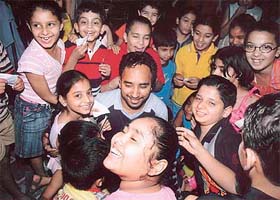 Comedian Rana Ranbir interacts with children during a summer camp organised at Tiny Tots Foundation School, Phase X, Mohali
