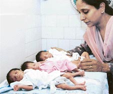 Ms Balwinder Kaur in a cheerful mood with her newborn triplets at City Nursing Home in Ludhiana 