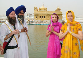 Spanish girls from Barcelona with Bhai Jaswinder Singh (second from left) after joining the Sikh fold in Amritsar on Monday.