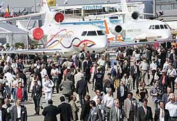 Visitors walk in front of the new Dassault Falcon 7X at the Paris Le Bourget Air Show on Tuesday. The show will be open to the public from June 17 to 19. Over 3 lakh visitors are expected at the show. Indias indigenously designed and developed Intermediate Jet Trainer (IJT) also made its debut flight at the show. 