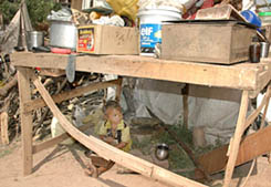A child seeks refuge under a table following the demolition a drive in Sector 21, Panchkula, on Tuesday.