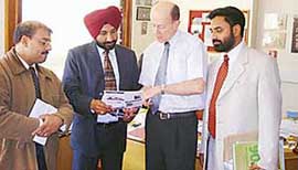 Mr Satnam Singh Sandhu and Mr R.S. Dhaliwal of CEC, Landran, with Prof Robert Moreton, Dean, Wolverhampton University, UK.