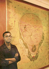 Chennai-based artist Blodsow with his creation on display at Alliance Francaise Art Gallery in Sector 36, Chandigarh, on Wednesday.
