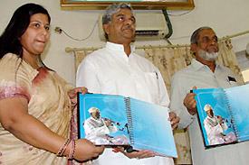 Union Minister of Power P.M. Sayeed and Sri Prakash Jaiswal releasing a 