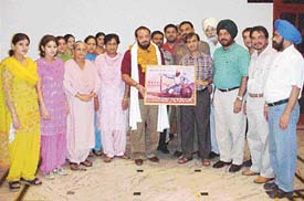 Mr Krishan Kumar Bawa, Chairman, Housefed, being presented a memento at a function organised by overseas units of Malwa Sabhyacharak Manch in Ludhiana on Wednesday.