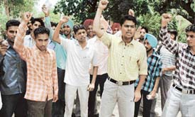 ITI students hold a protest rally to press for their demands in Ludhiana on Wednesday. 