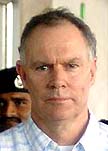 Indian cricket teams coach Greg Chappell arrives at the Mumbai airport on Wednesday