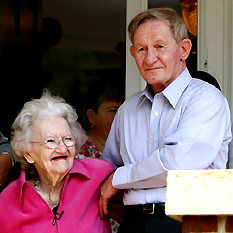 Charles Robert Jenkins, a former US Army sergeant who fled to North Korea in 1965, stands with his 91-year-old mother Patty Casper on the porch of his sister's home in Weldon, North Carolina on Wednesday