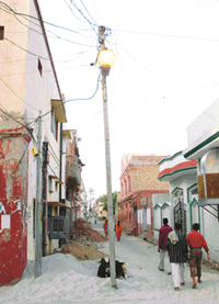 Inviting accidents: An electricity pole installed in the middle of a street in Kapurthala. 