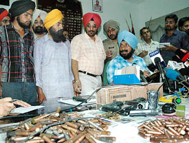 The police shows arms and ammunition seized from Paramjit Singh and Swaran Singh, the two accomplices of Jagtar Singh Hawara, in Ropar on Thursday