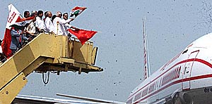 Civil Aviation Minister Praful Patel flags off the inaugural direct Kolkata to London flight of Air-India at NSCB Airport in Kolkata on Saturday. Mr Patel said that the Indian Aviation sector would witness an investment up to $ 30 billion during the next five years for modernisation and fleet expansion.