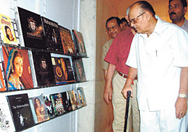 Union HRD Minister Arjun Singh visiting a book exhibition just before the 32nd Annual General Meeting of the Federation of Indian Publishers in the Capital