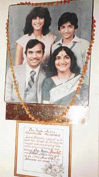 A photograph of Om Prakash, Indu, Ruchi and Rikki on the hospital premises